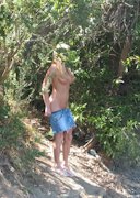 Blonde girl skinny dipping in public