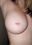 Busty amateur Ashtynn takes pics of her tits