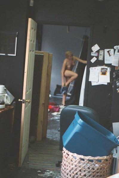 Spy pics of blonde undressing