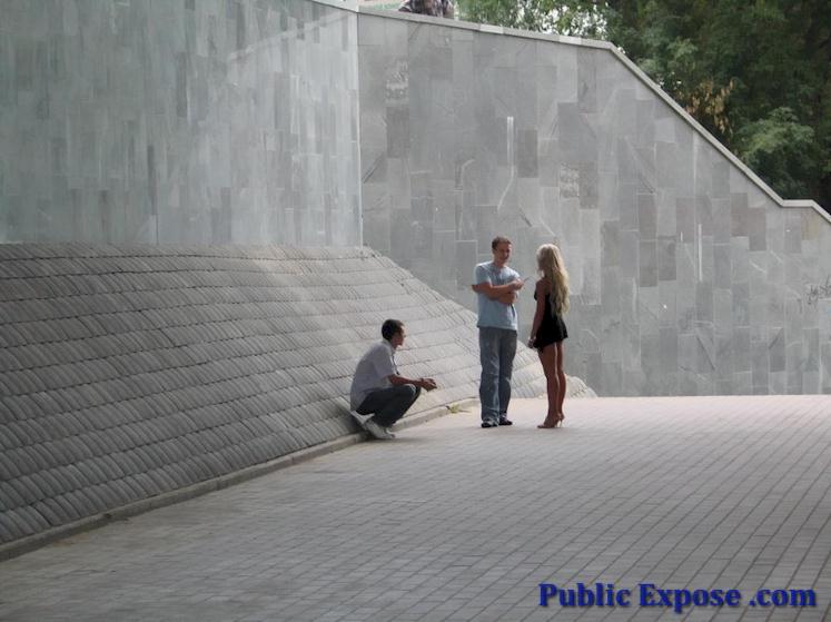 Blonde get naked in a street
